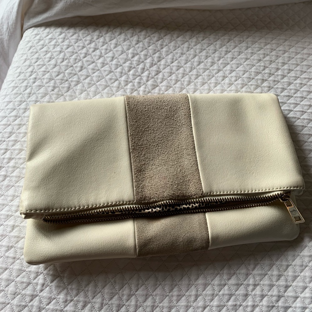 Cream/tan fold-over clutch